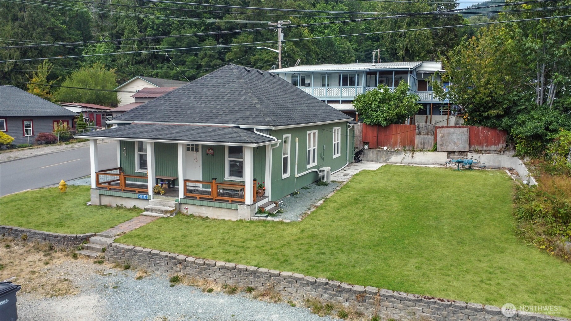45337 Main Street Concrete, WA 98237 - Photo 5 of 40 a house view with a garden space