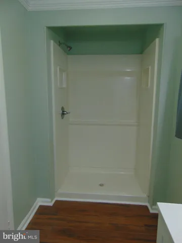 a bathroom with a toilet and a sink