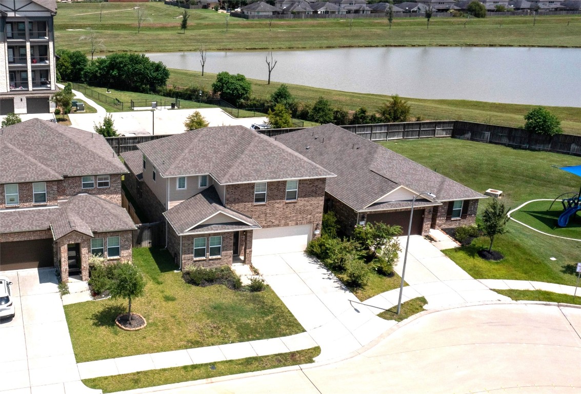 21606 Reserve Ranch Trail Richmond, TX 77407 - Photo 2 of 48 an aerial view of a house with a garden view