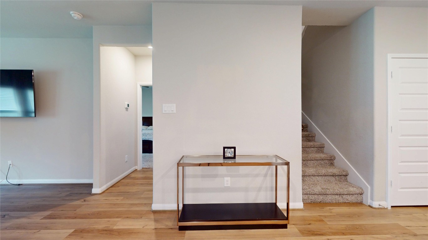 21606 Reserve Ranch Trail Richmond, TX 77407 - Photo 21 of 48 a view of entryway and hall with wooden floor