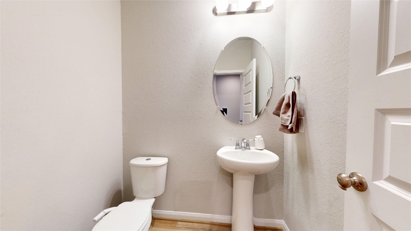 21606 Reserve Ranch Trail Richmond, TX 77407 - Photo 35 of 48 a bathroom with a sink toilet