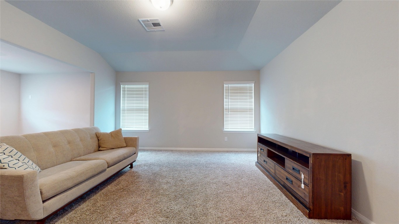 21606 Reserve Ranch Trail Richmond, TX 77407 - Photo 37 of 48 a living room with furniture and a window
