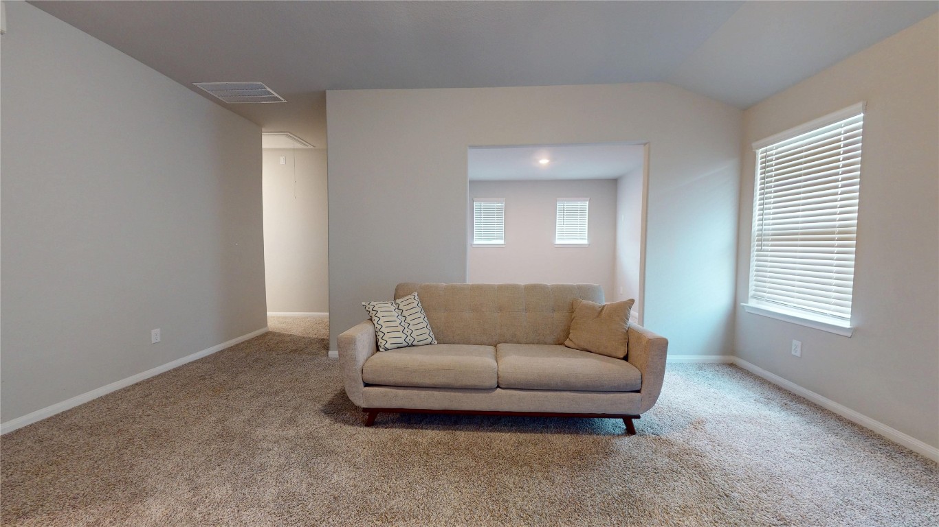 21606 Reserve Ranch Trail Richmond, TX 77407 - Photo 38 of 48 a living room with furniture and a window