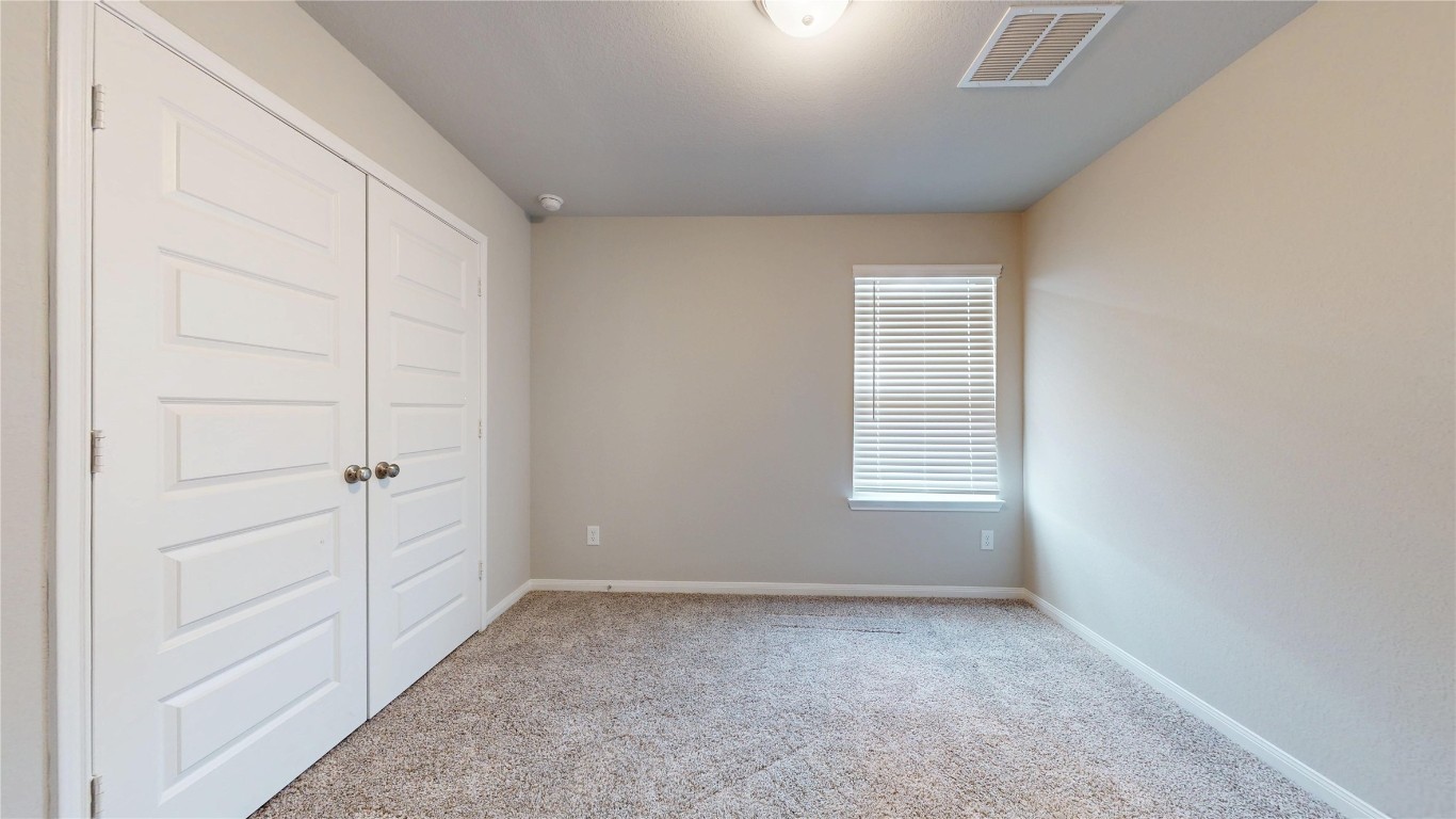 21606 Reserve Ranch Trail Richmond, TX 77407 - Photo 41 of 48 an empty room with a empty space and window