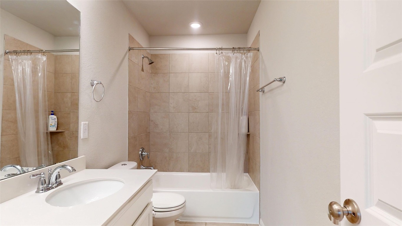 21606 Reserve Ranch Trail Richmond, TX 77407 - Photo 43 of 48 a bathroom with a sink toilet and shower