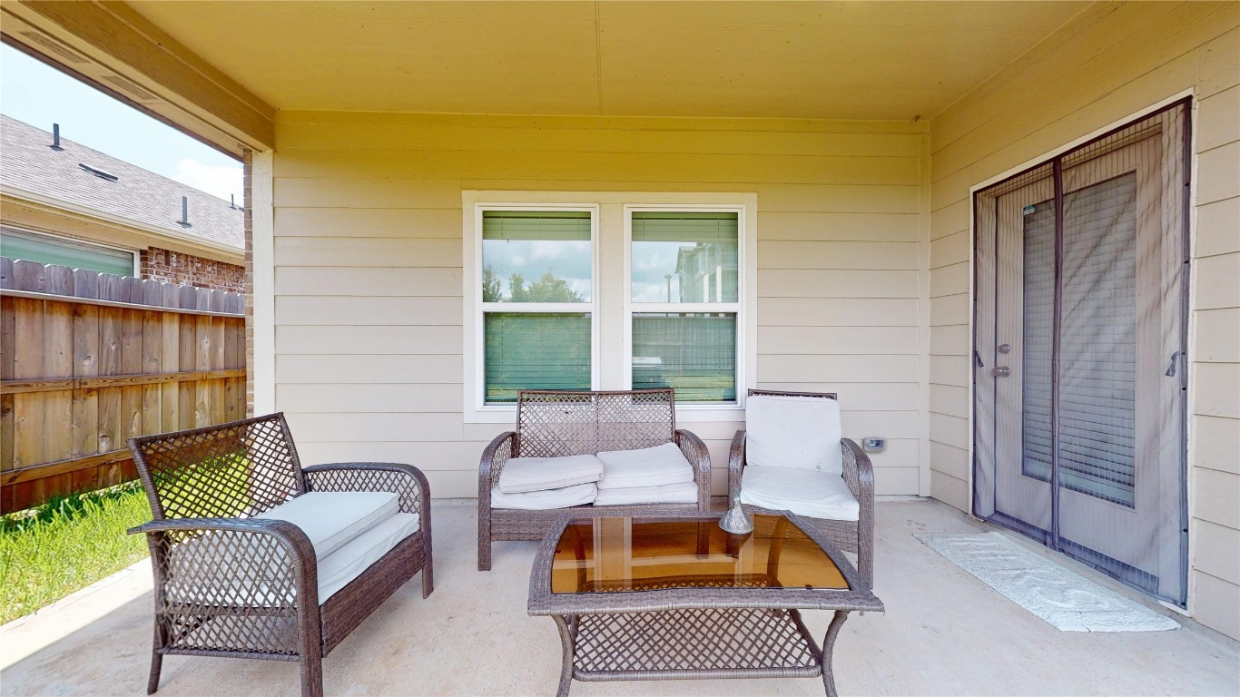 21606 Reserve Ranch Trail Richmond, TX 77407 - Photo 47 of 48 a building outdoor space with patio furniture
