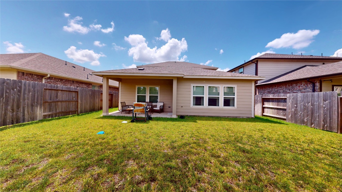21606 Reserve Ranch Trail Richmond, TX 77407 - Photo 48 of 48 a view of a house with swimming pool and a yard