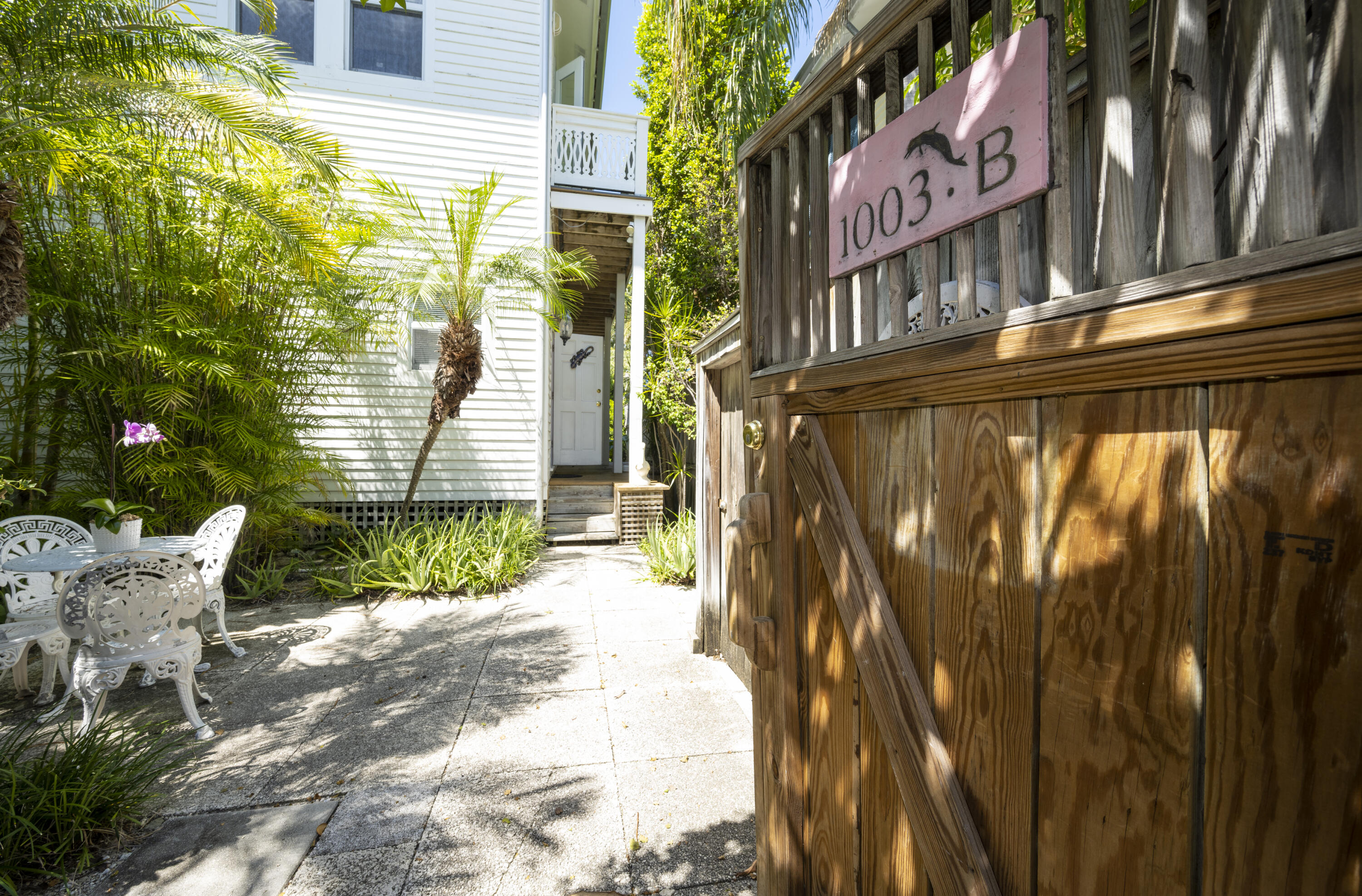 1003 United Street, Unit B Key West, FL 33040 - Photo 2 of 39 a view of a building with a yard
