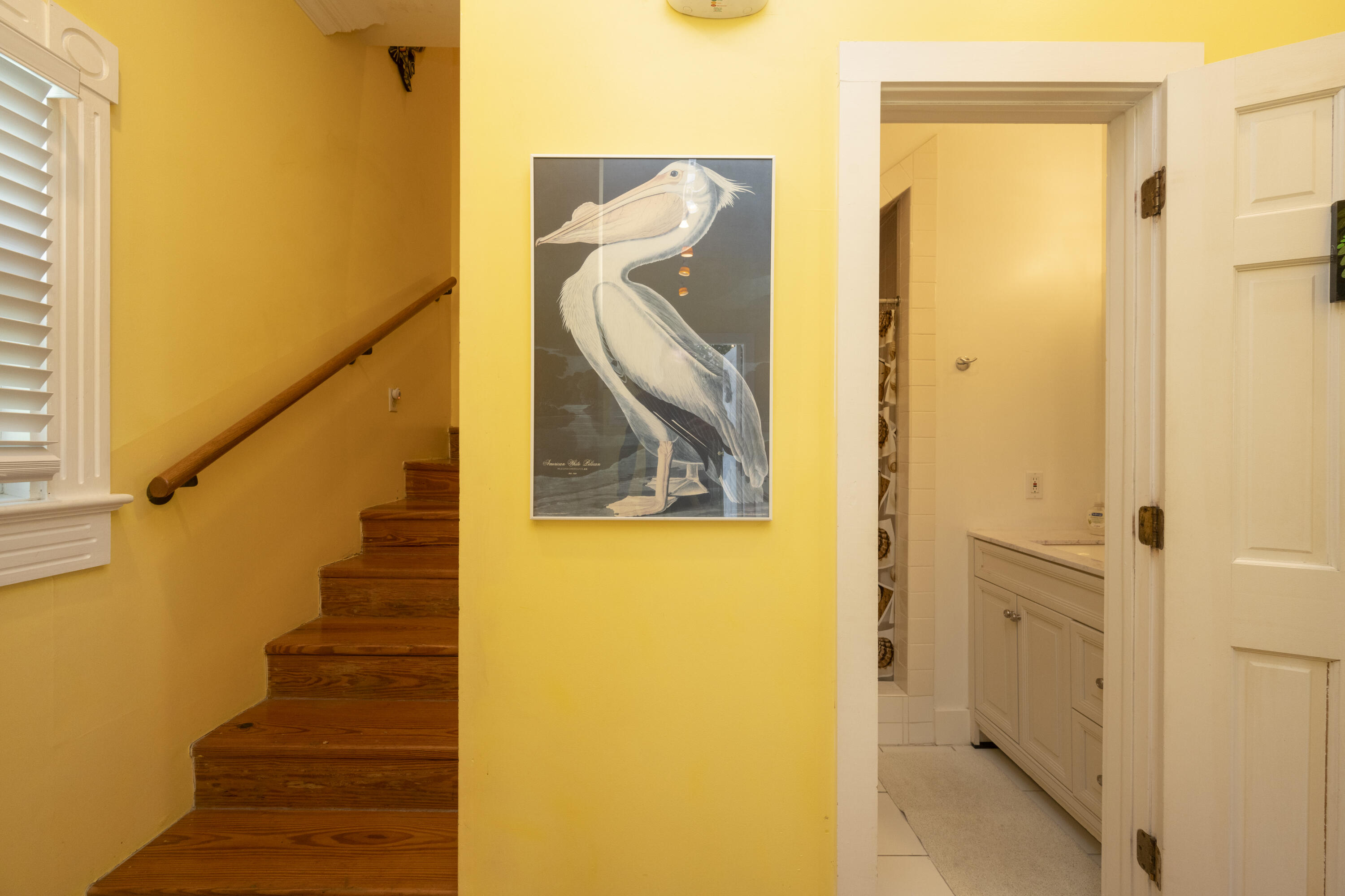 1003 United Street, Unit B Key West, FL 33040 - Photo 20 of 39 a view of a hallway with wooden floor