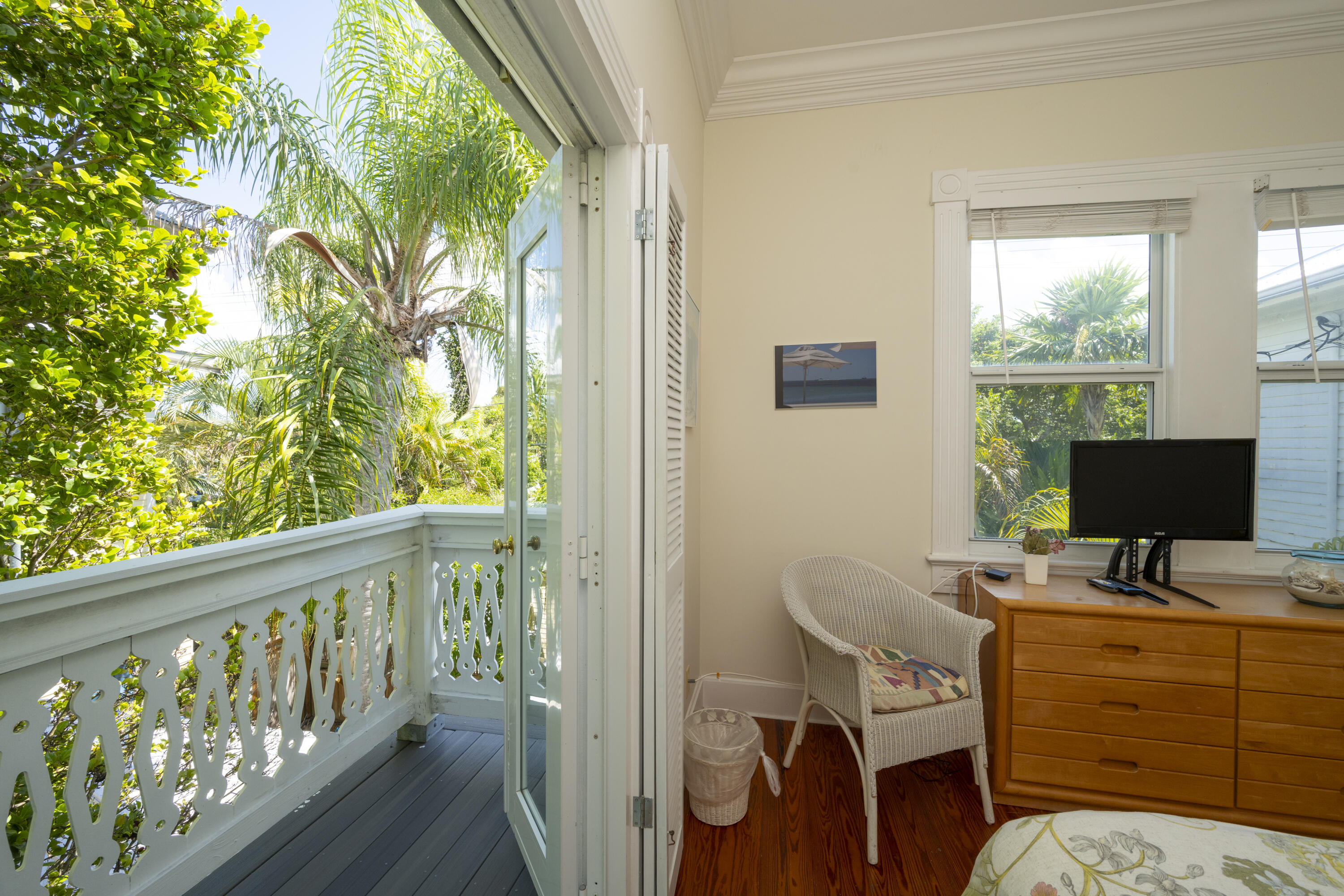 1003 United Street, Unit B Key West, FL 33040 - Photo 23 of 39 a view of a workspace with furniture and a window