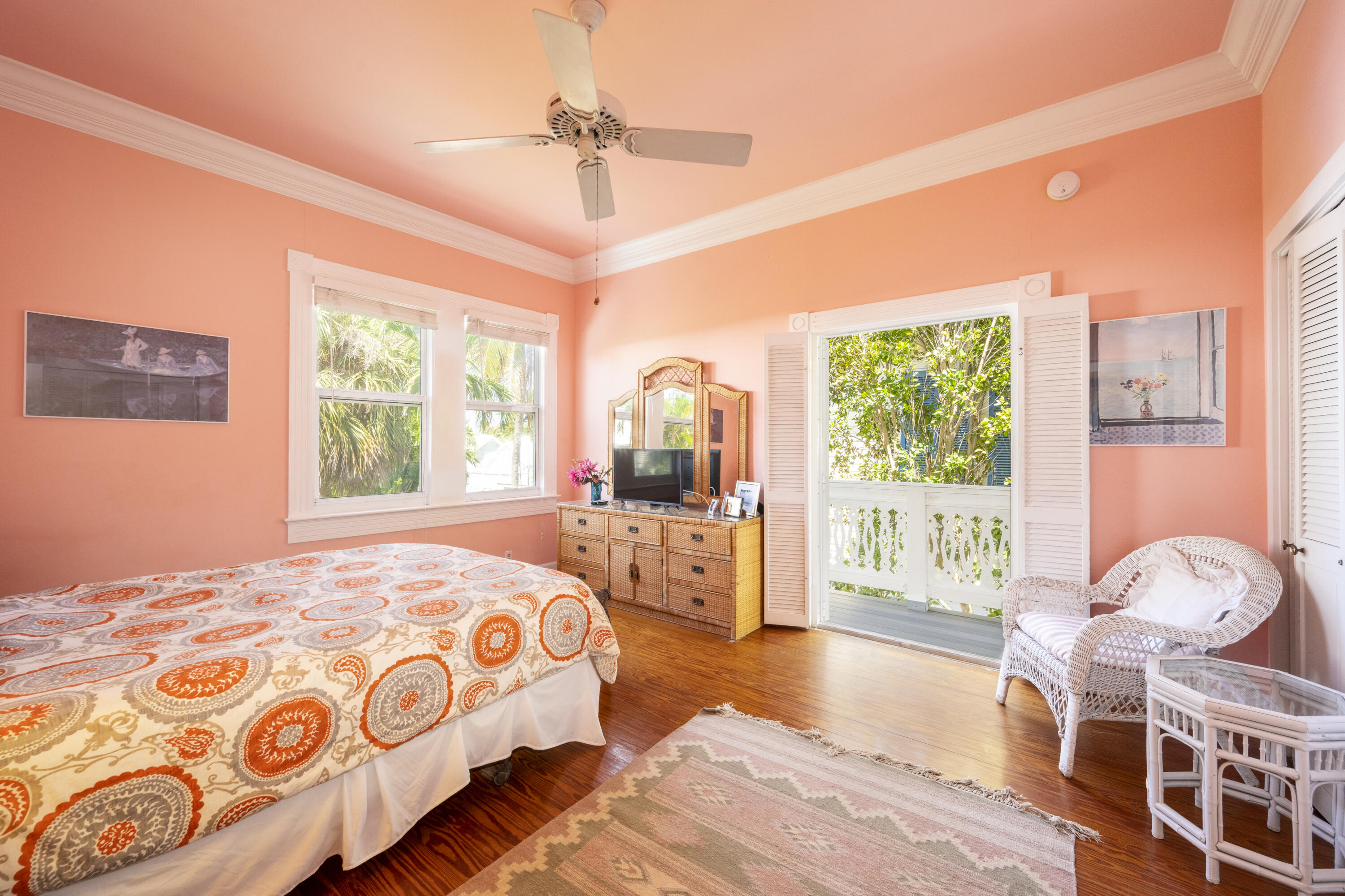 1003 United Street, Unit B Key West, FL 33040 - Photo 28 of 39 a bedroom with a large bed and a window