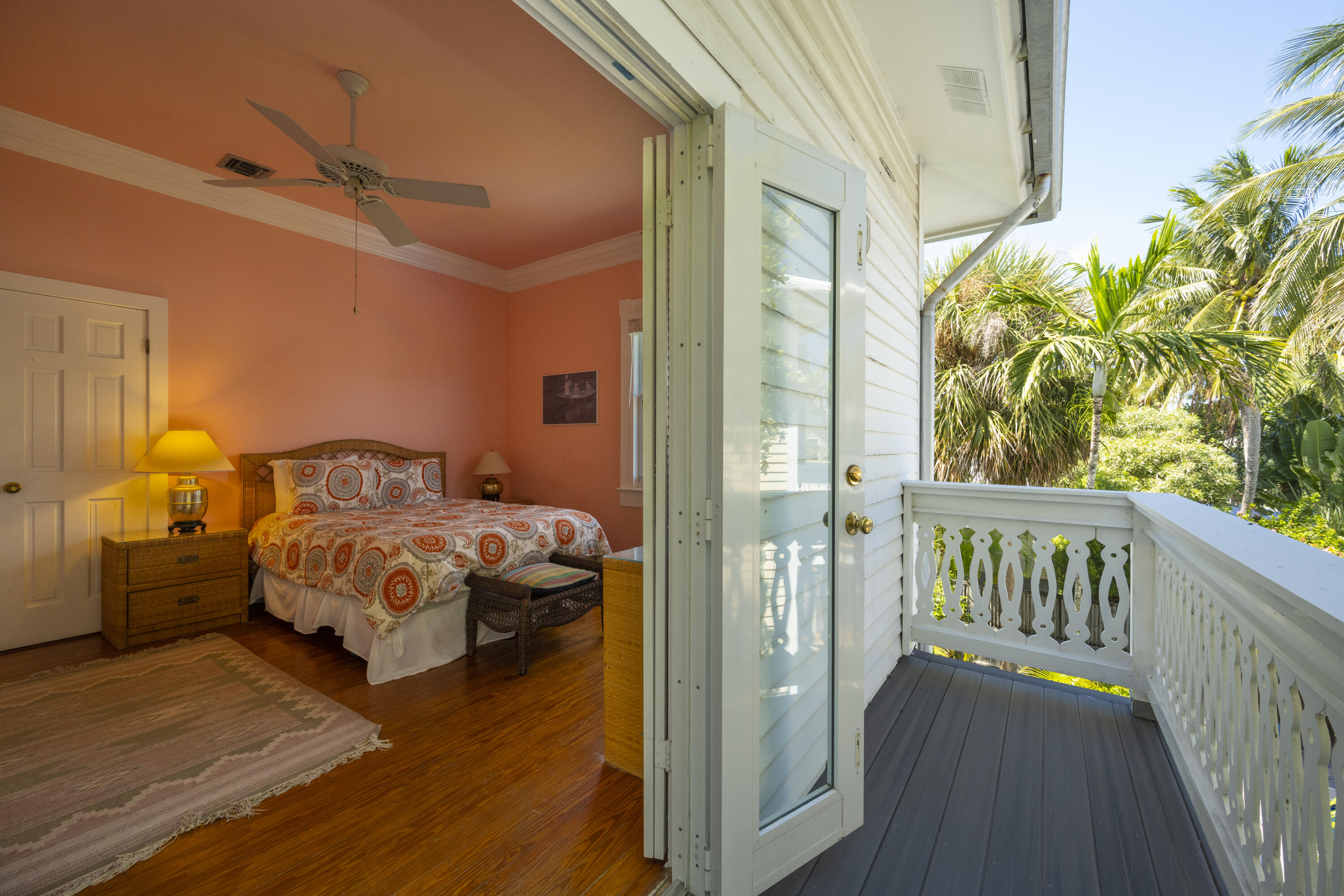 1003 United Street, Unit B Key West, FL 33040 - Photo 30 of 39 a bedroom with a bed next to a window