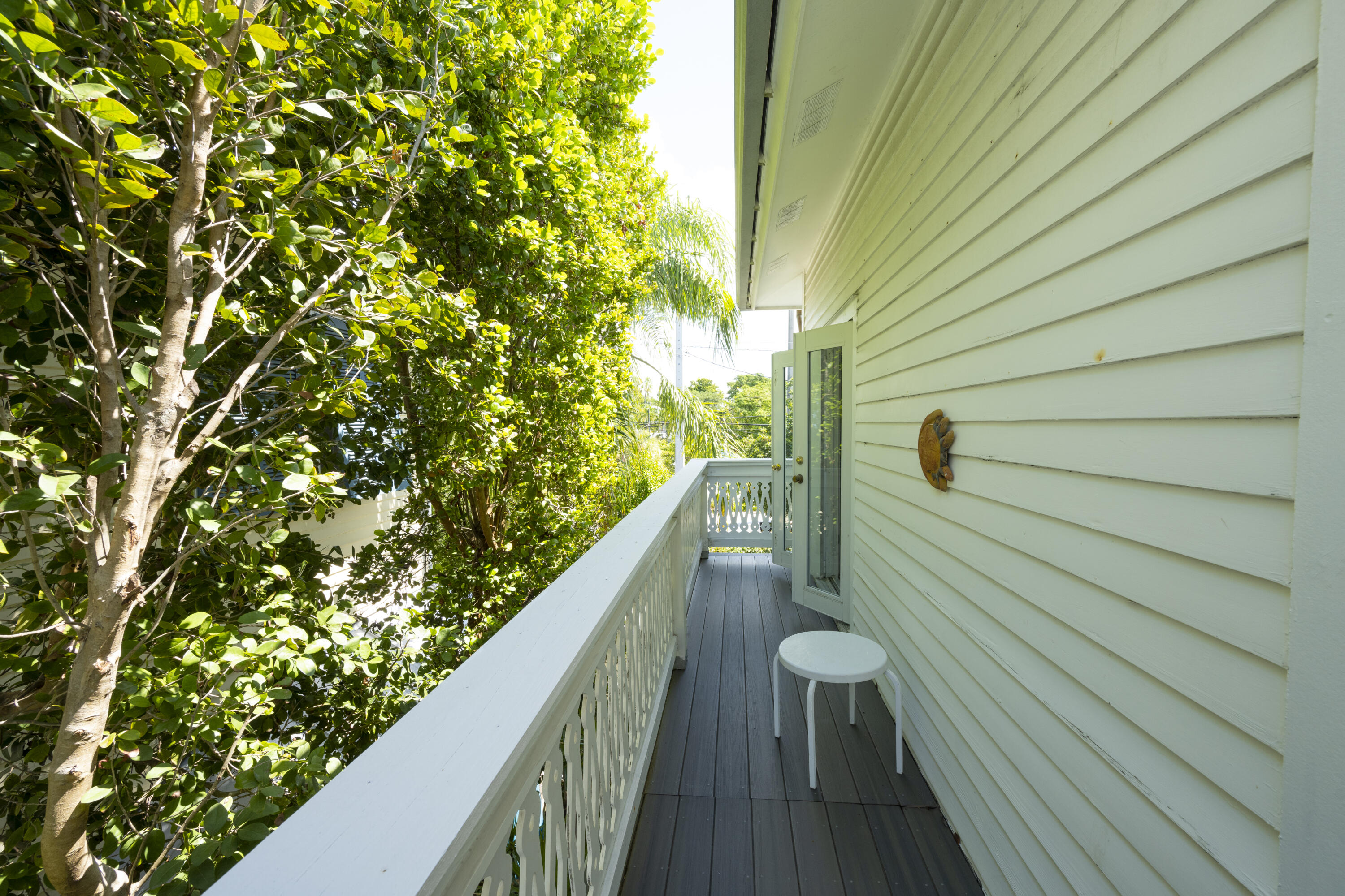 1003 United Street, Unit B Key West, FL 33040 - Photo 31 of 39 a balcony with view of a house