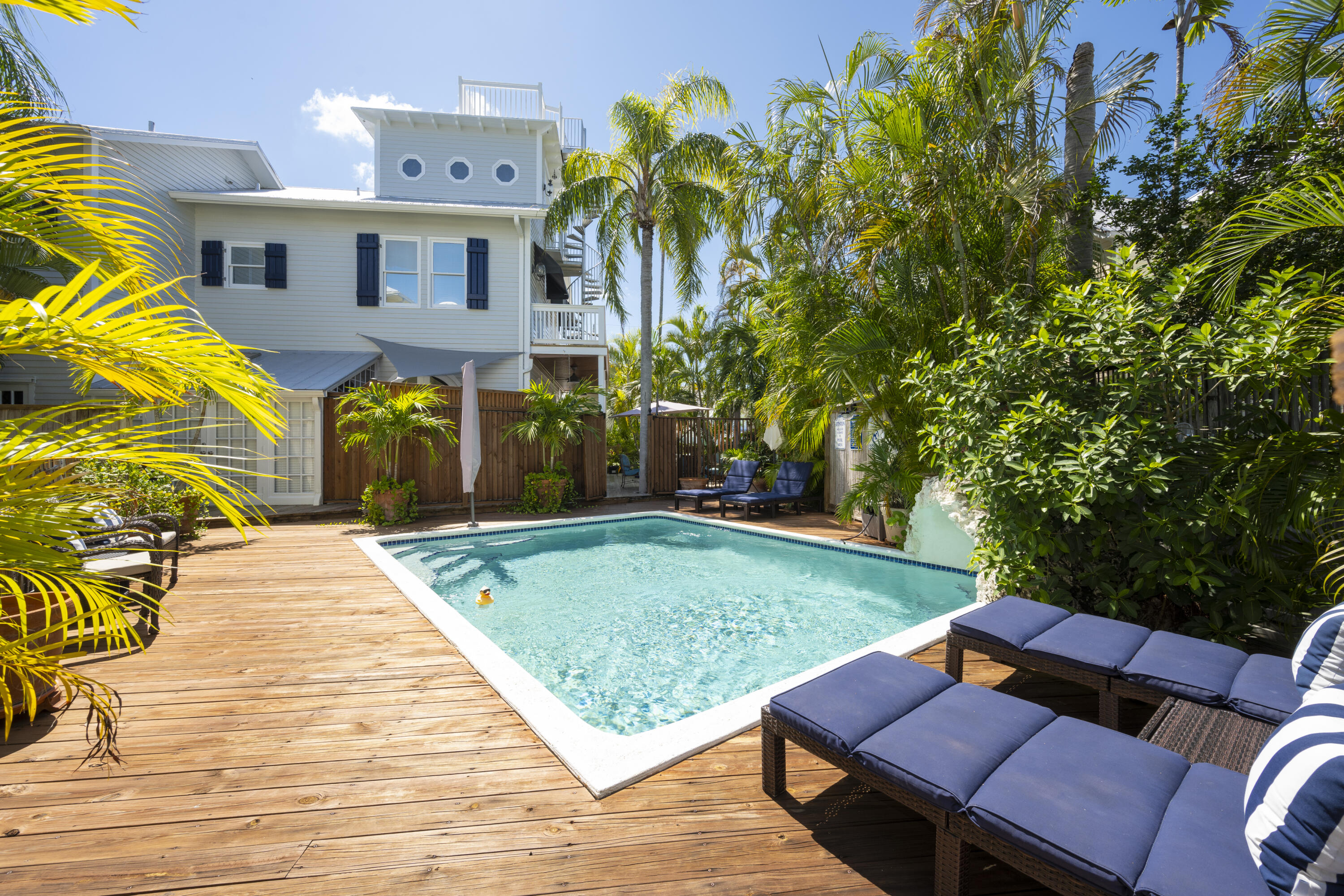 1003 United Street, Unit B Key West, FL 33040 - Photo 38 of 39 swimming pool view with a seating space