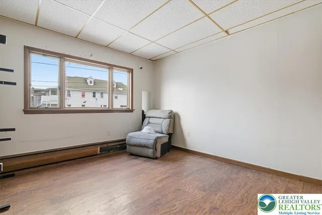 a room with furniture and window