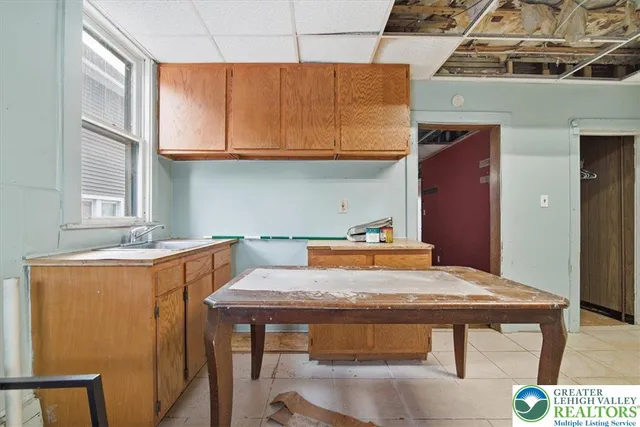 a view of an empty room with glass door