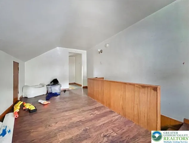 a view of a balcony with furniture