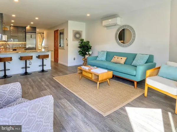 a living room with furniture and a table