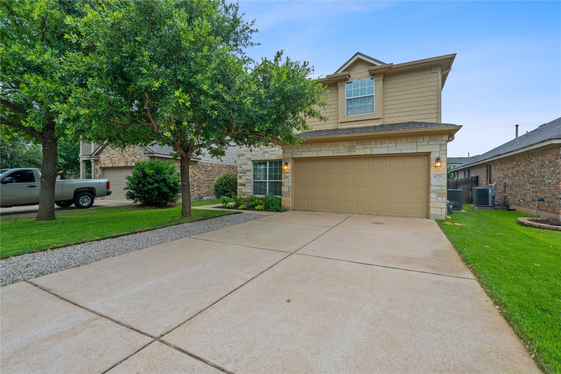 11221 Old Quarry Road Austin, TX 78717 - Photo 1 of 1 a house view with a garden space