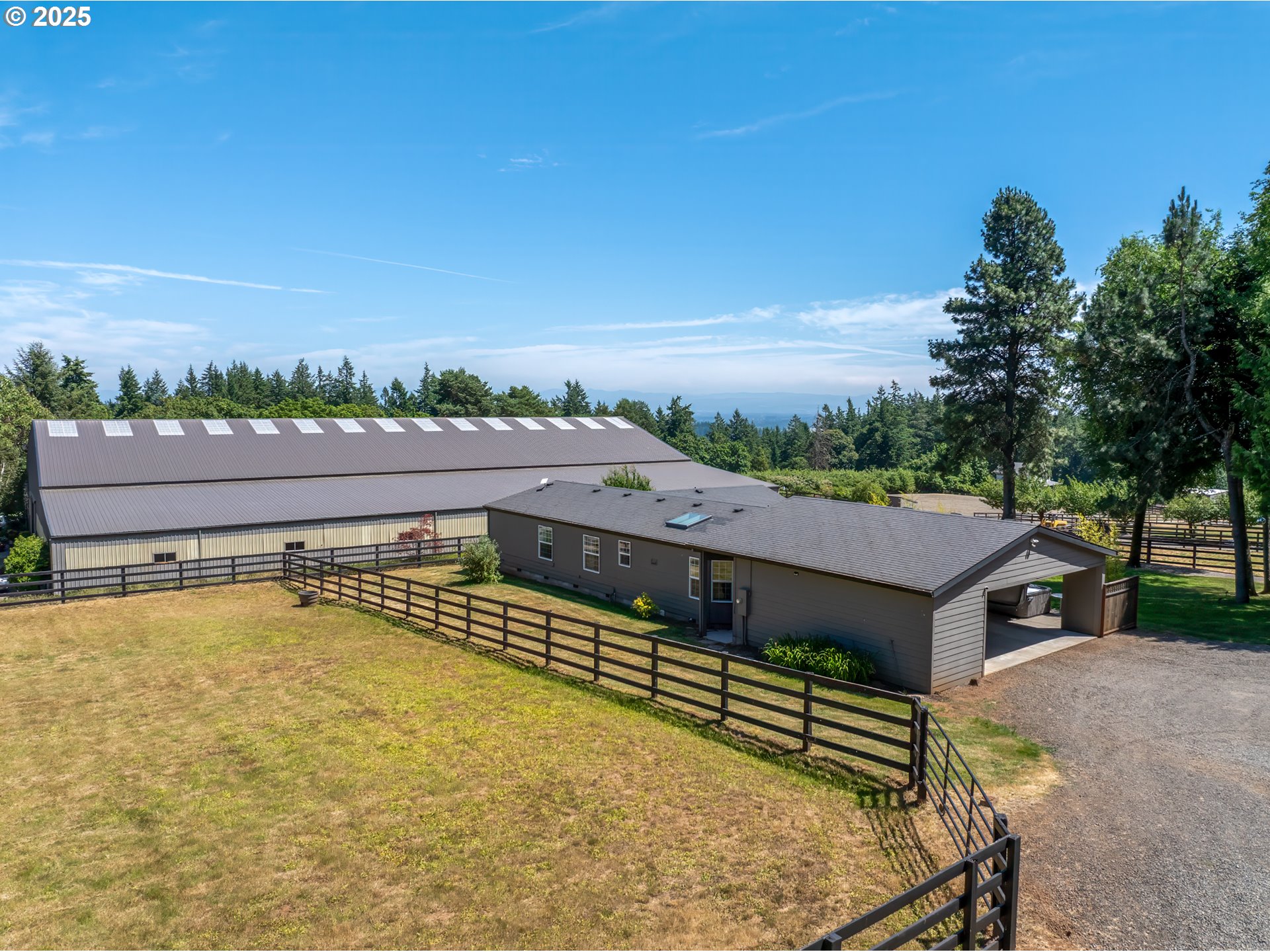 34680 Northeast Kramien Road Newberg, OR 97132 - Photo 21 of 40 a view of a balcony with two chairs and a table
