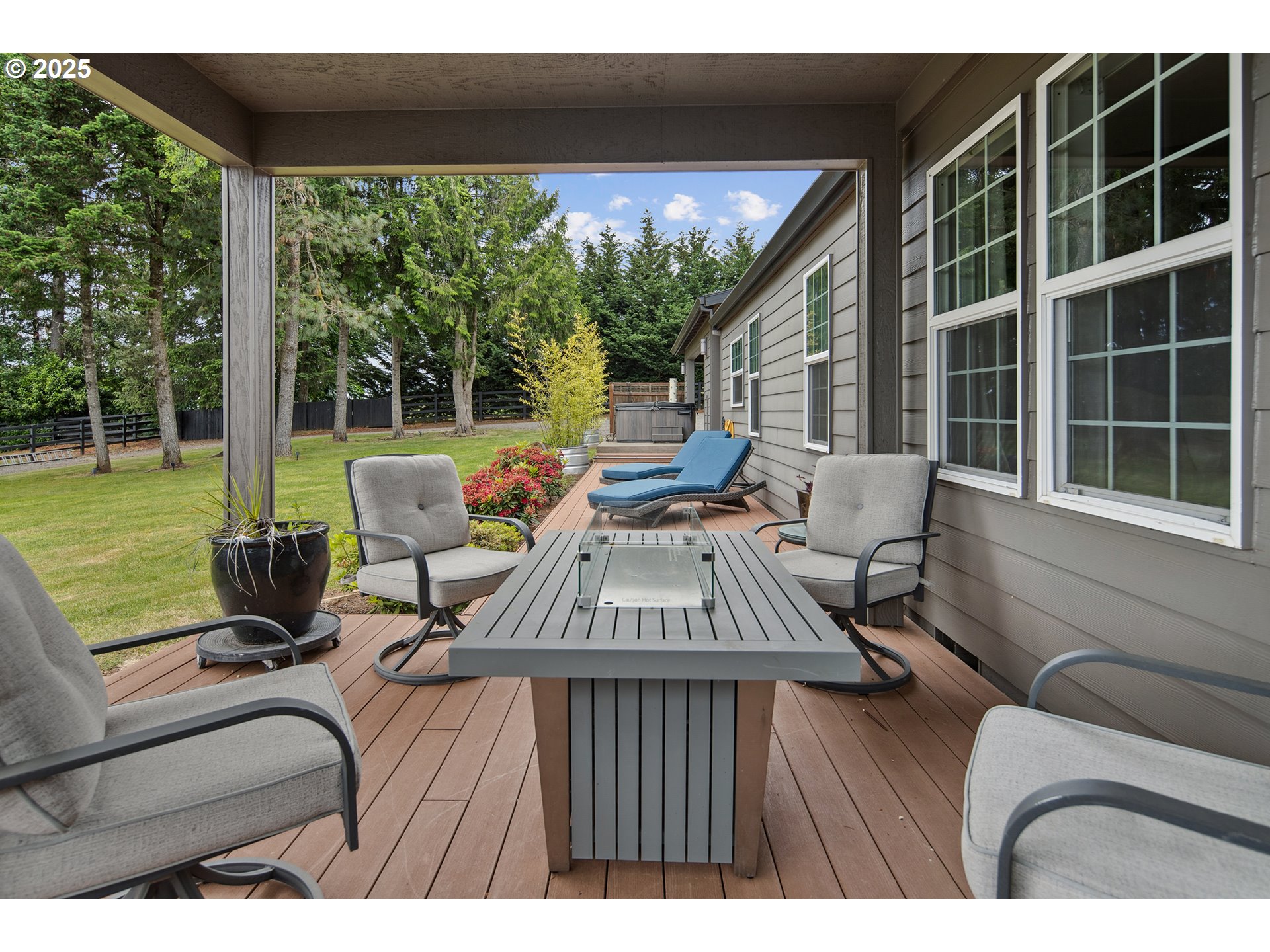 34680 Northeast Kramien Road Newberg, OR 97132 - Photo 23 of 40 a view of a patio with dining table and chairs