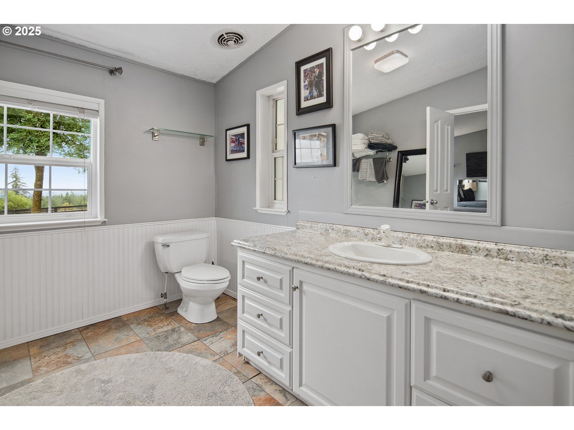 34680 Northeast Kramien Road Newberg, OR 97132 - Photo 31 of 40 a bathroom with a granite countertop toilet sink and mirror