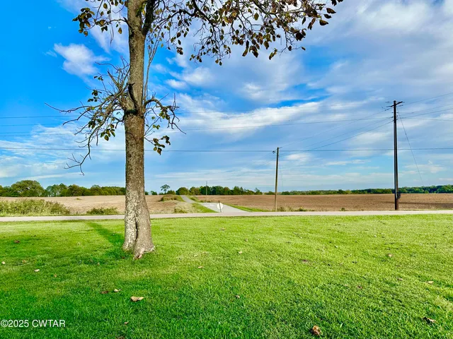 a view of a terrace with a big yard