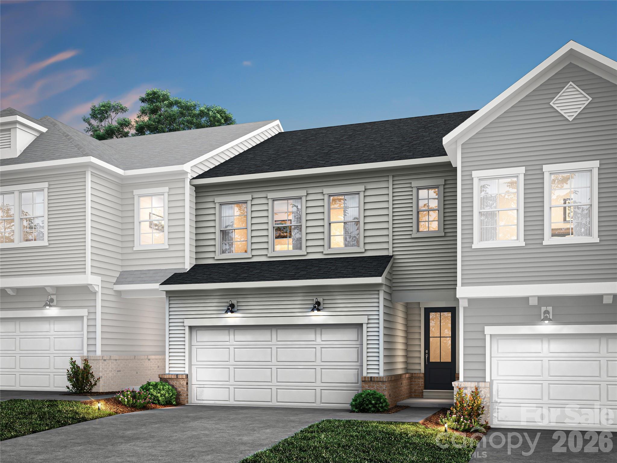 620 Webster Lane Cramerton, NC 28032 - Photo 1 of 19 a front view of a house with a yard and garage