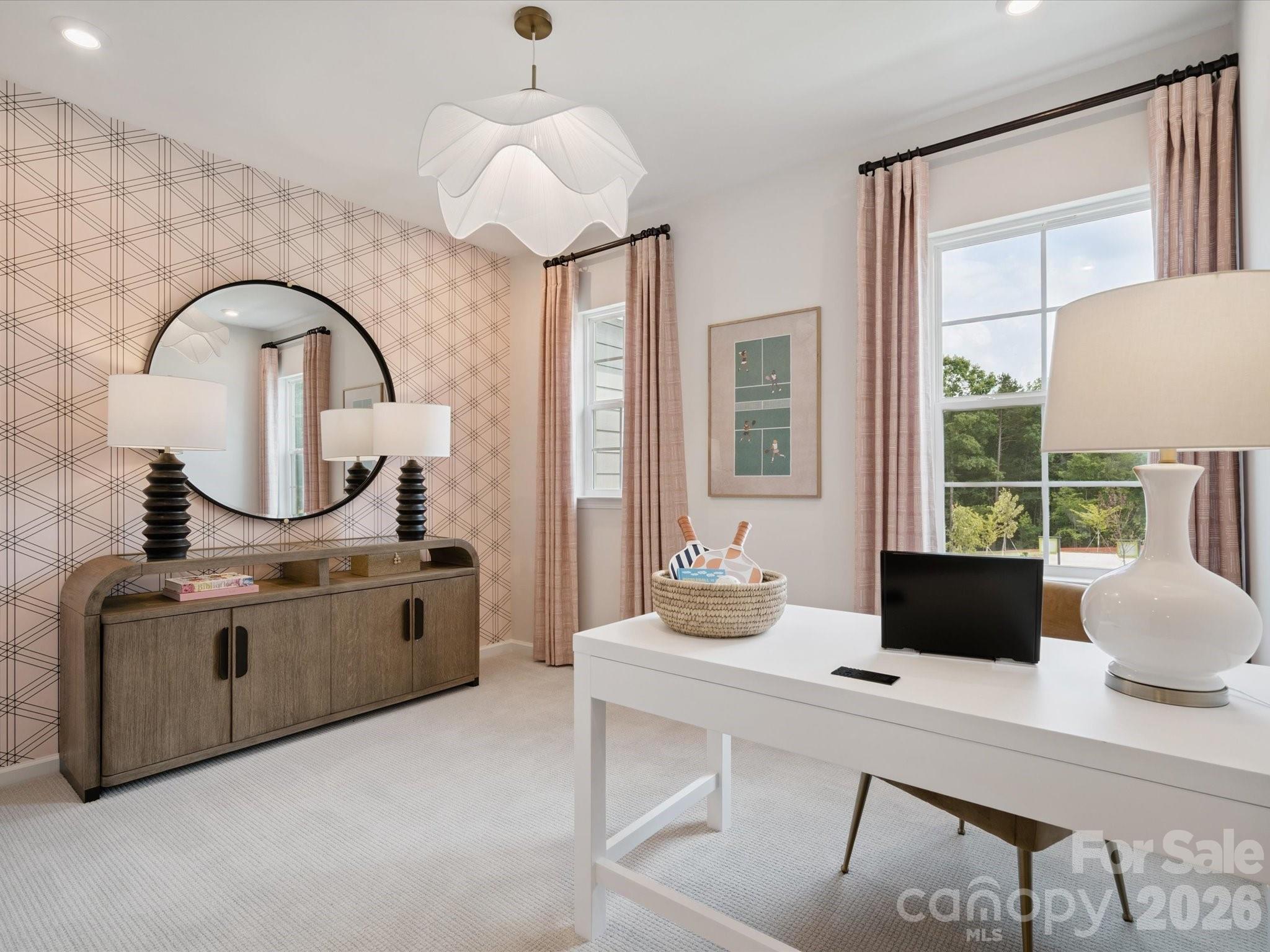 620 Webster Lane Cramerton, NC 28032 - Photo 12 of 19 a room with a table chairs and a wooden floor