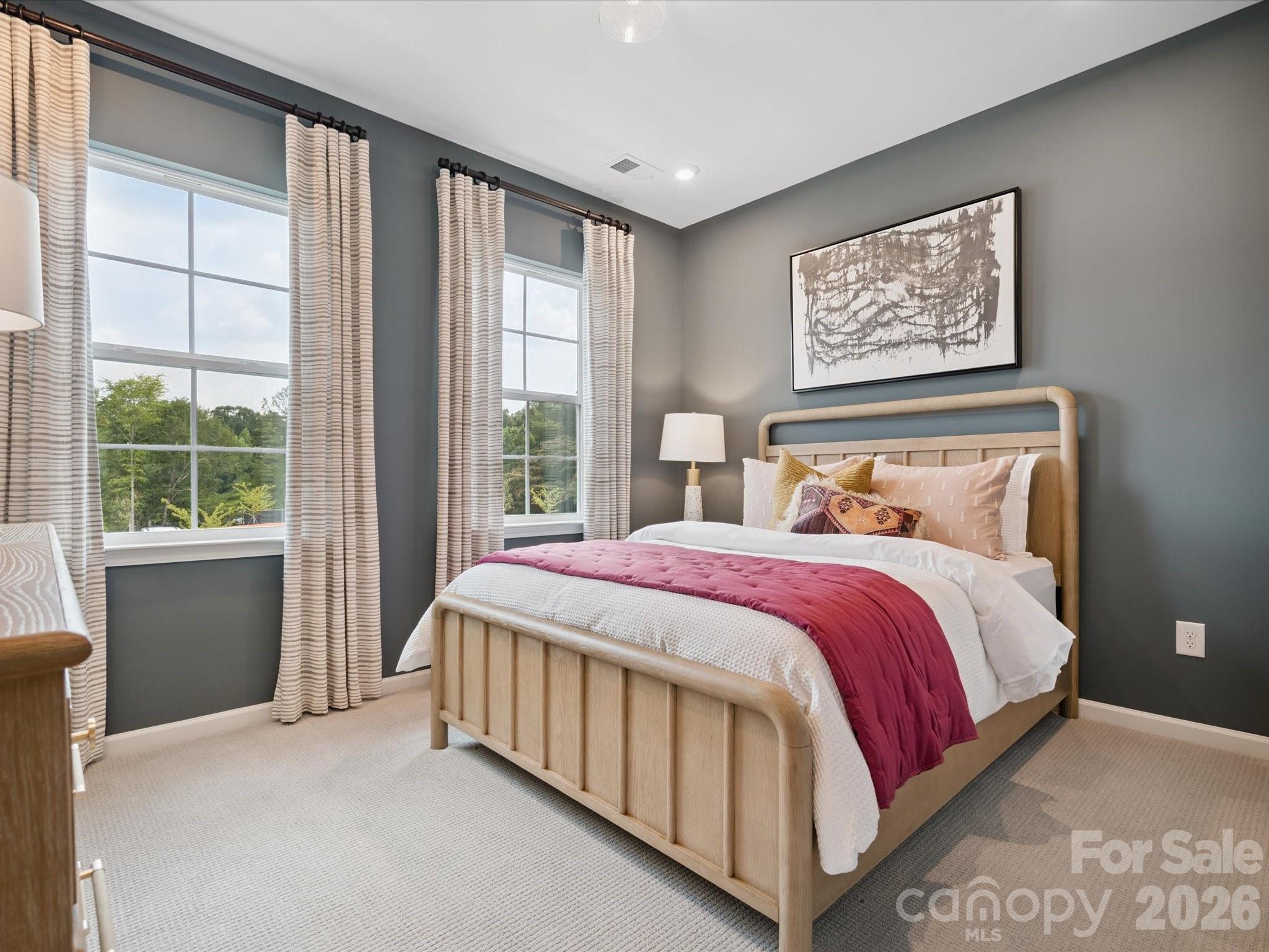 620 Webster Lane Cramerton, NC 28032 - Photo 13 of 19 a bedroom with a large bed and a large window