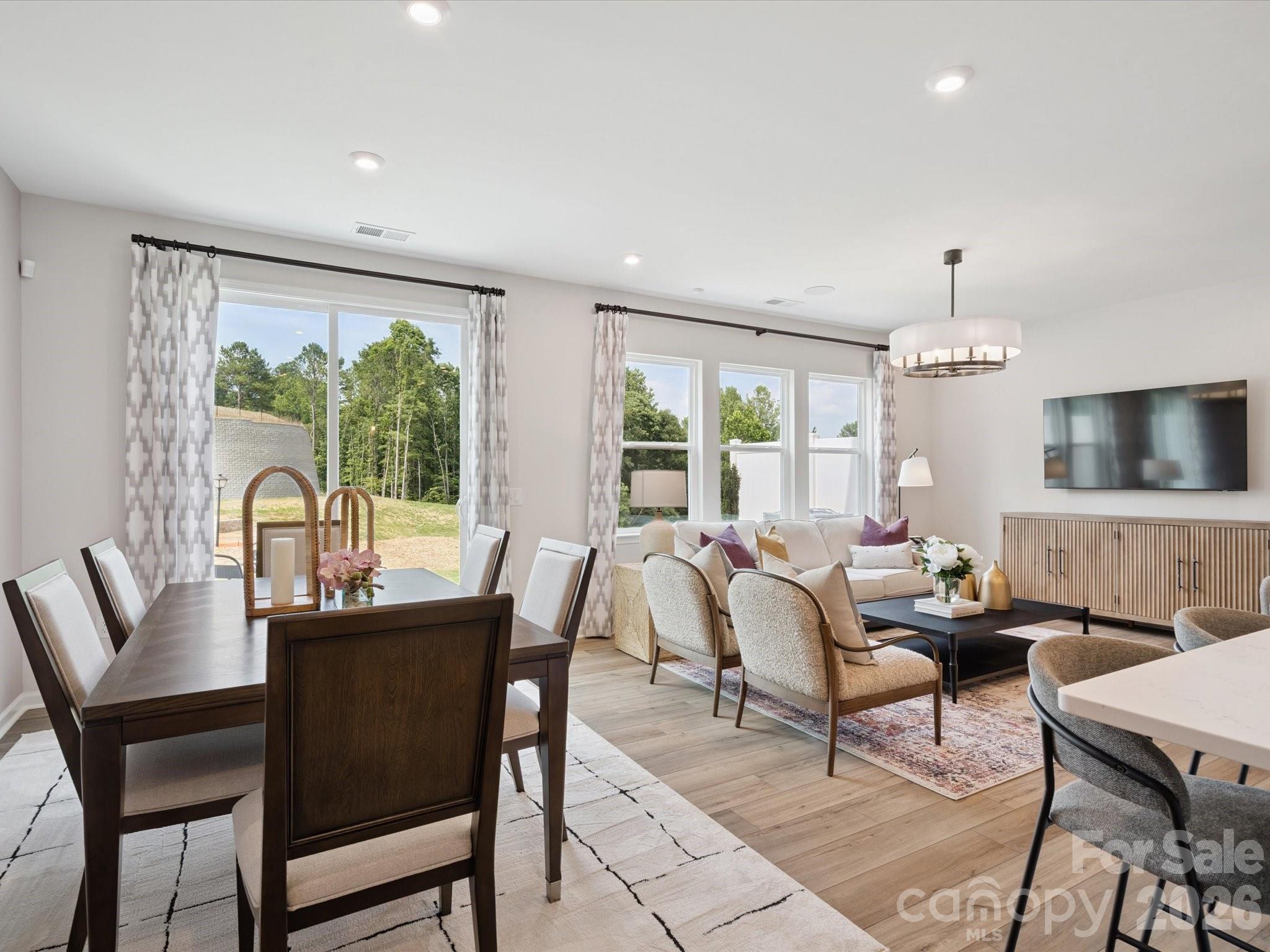 620 Webster Lane Cramerton, NC 28032 - Photo 10 of 19 a dining room with furniture window and wooden floor