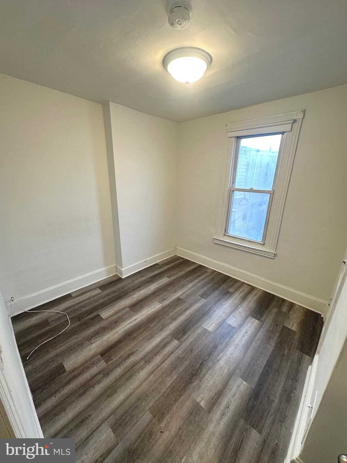 2826 Cedar Street Philadelphia, PA 19134 - Photo 6 of 8 a view of empty room with wooden floor