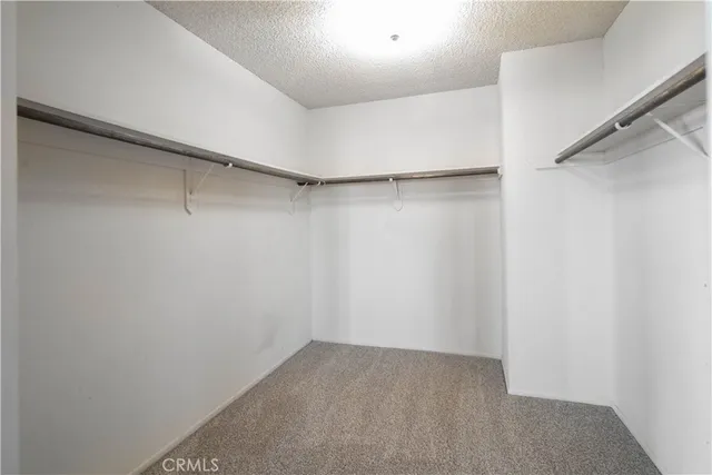 a bathroom with a sink vanity mirror and toilet