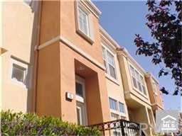A beautiful 2-story condo in a gated community with 2 attached car garage
