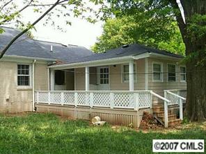 338 Marsh Road Charlotte, NC 28209 - Photo 2 of 7 a front view of a house with a garden