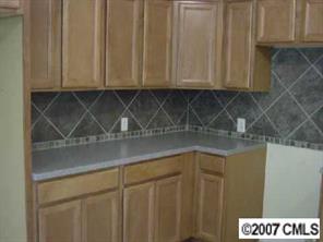 338 Marsh Road Charlotte, NC 28209 - Photo 5 of 7 a view of storage and utility room with window