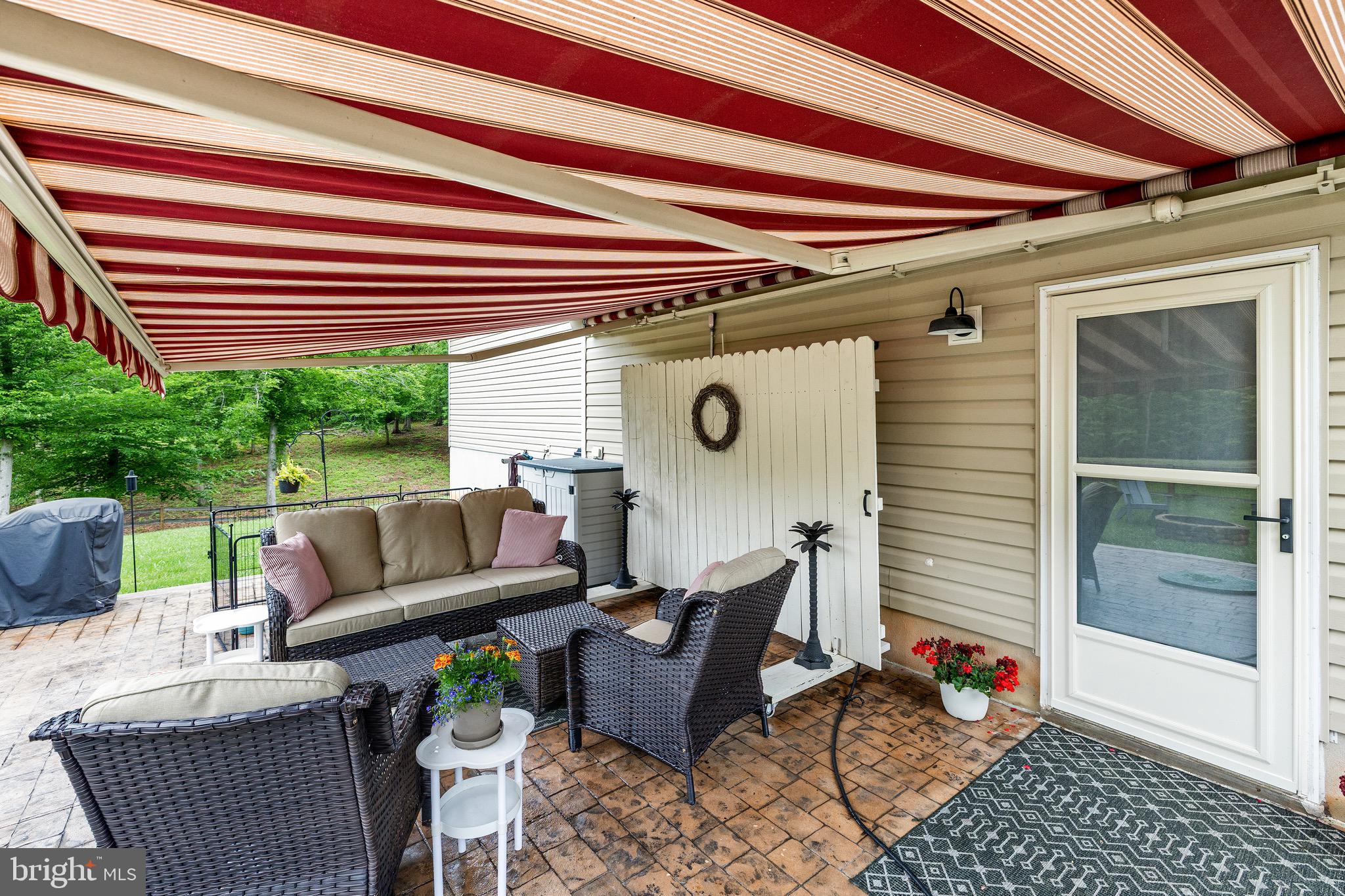 30367 Old Locust Grove Locust Grove, VA 22508 - Photo 5 of 36 a patio with patio furniture and potted plants