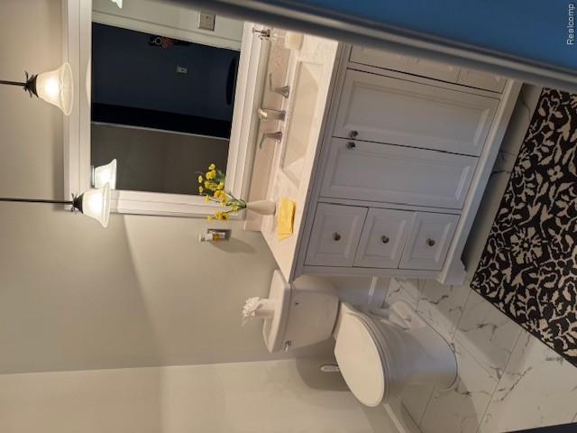 31056 Richert Street, Unit 8 Fraser, MI 48026 - Photo 13 of 19 Bathroom featuring vanity and light marble finish floors