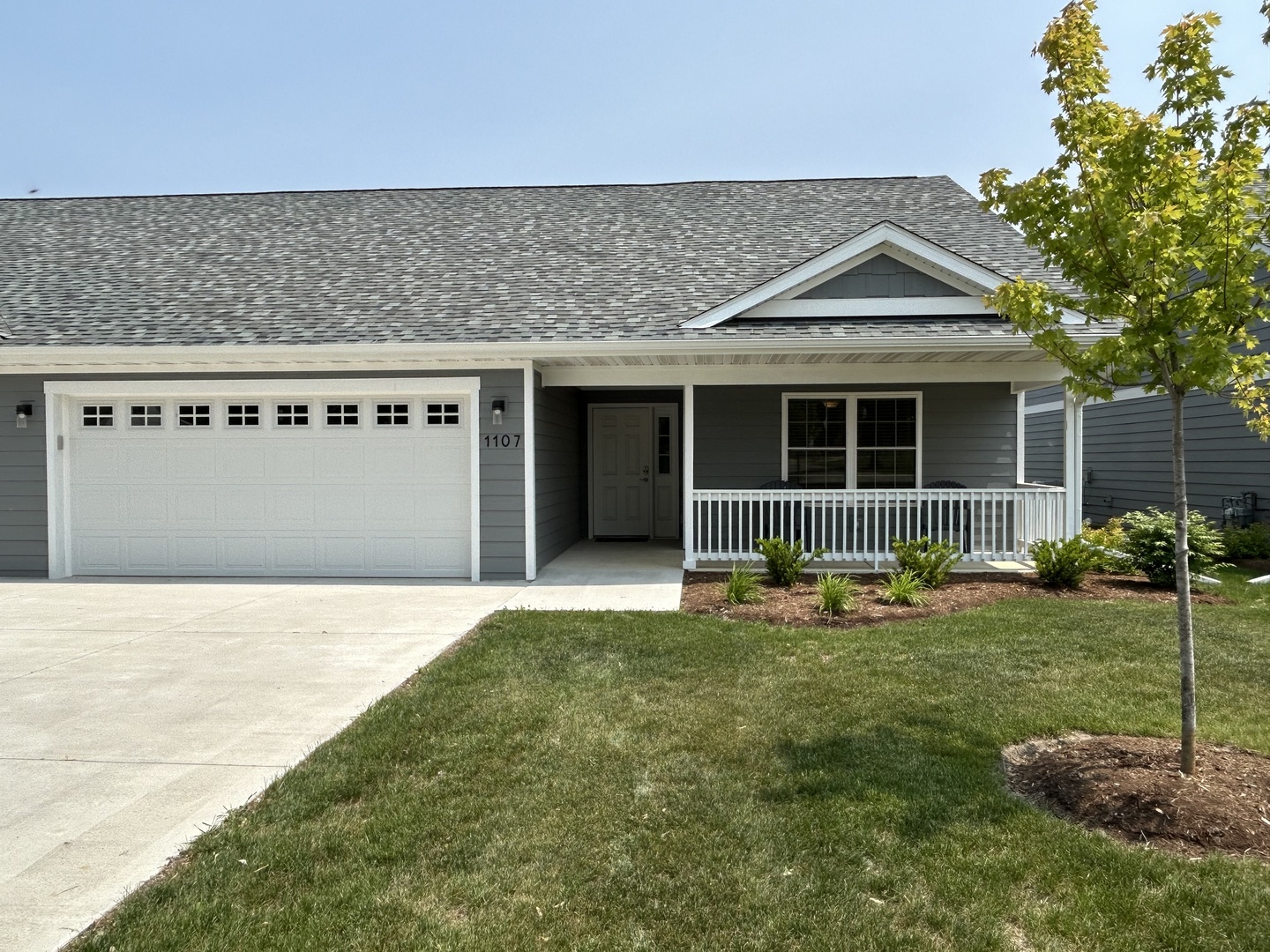 1107 South 2nd Street Oregon, IL 61061 - Photo 1 of 10 a front view of a house with a yard