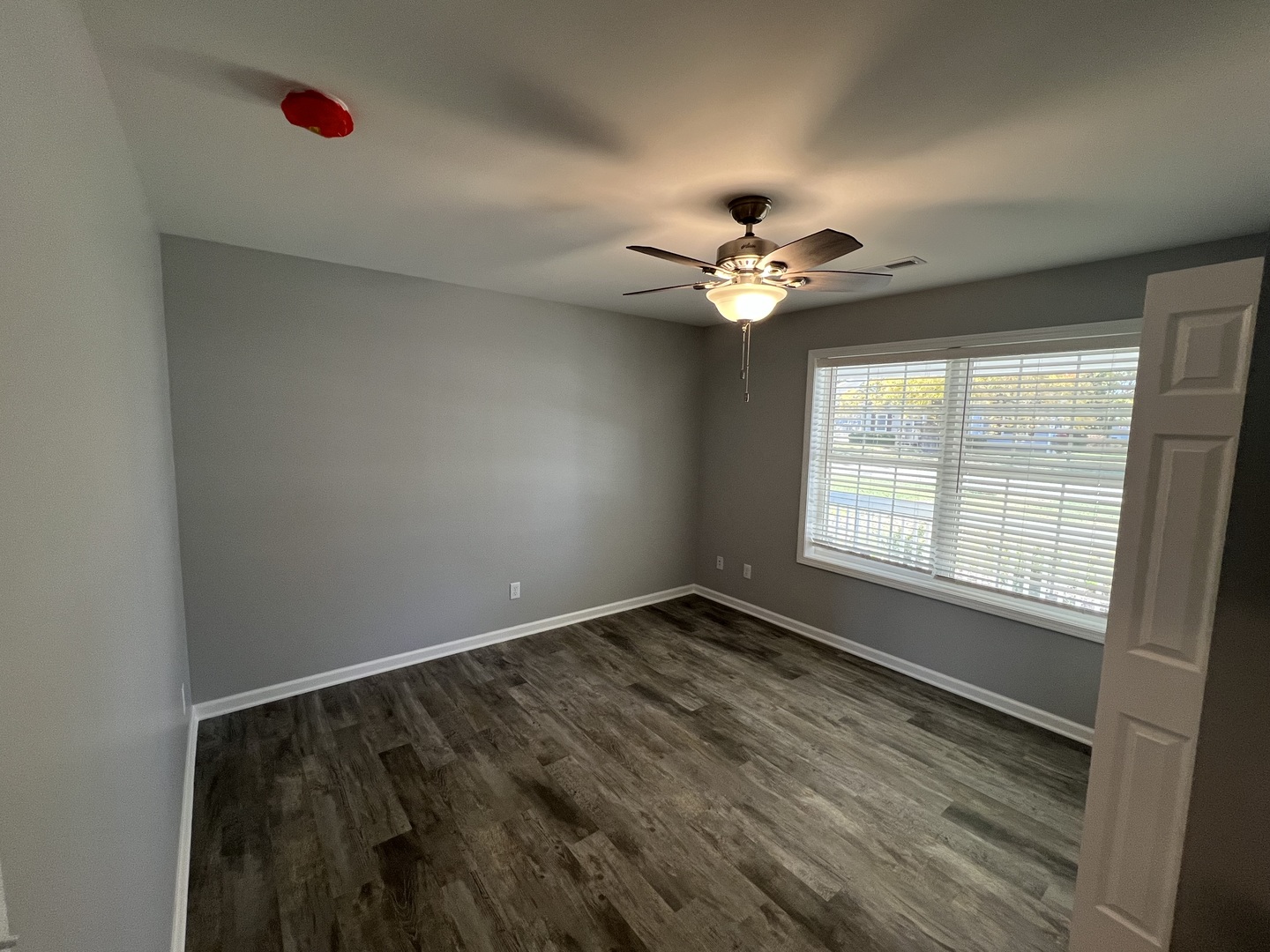 1107 South 2nd Street Oregon, IL 61061 - Photo 4 of 10 a view of an empty room with a window