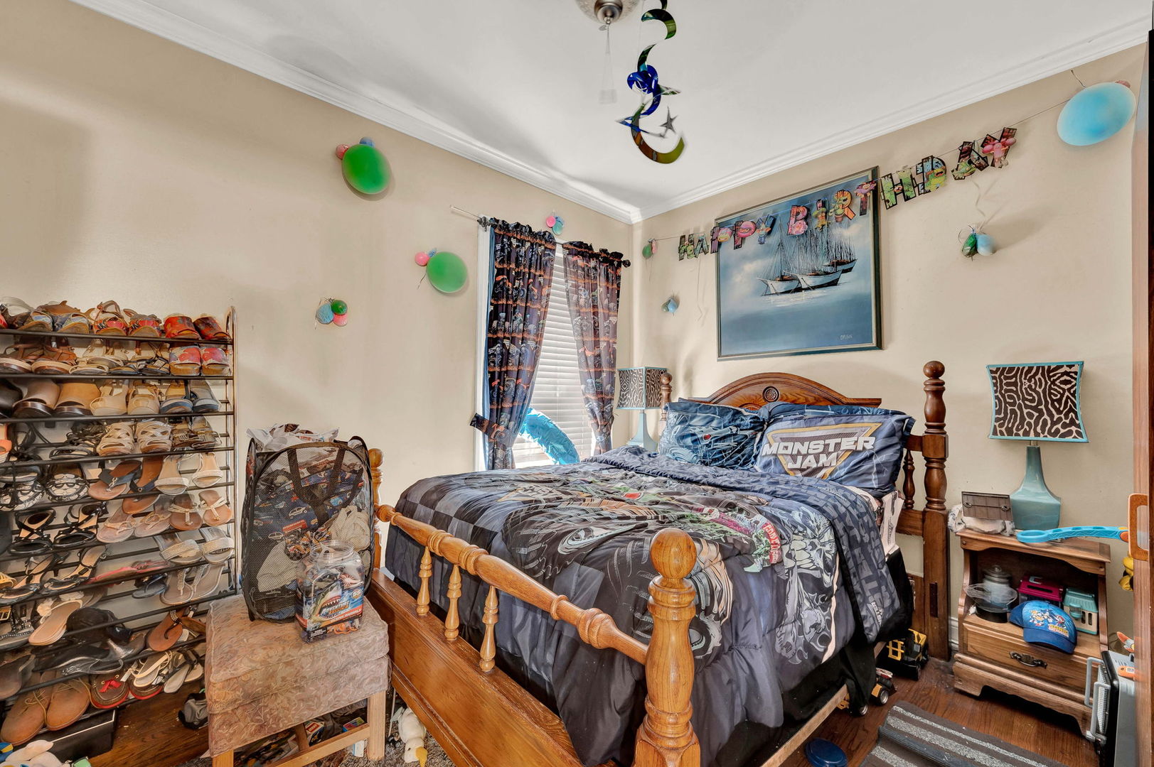 7800 South Aberdeen Street Chicago, IL 60620 - Photo 8 of 13 a bedroom with bed and a window