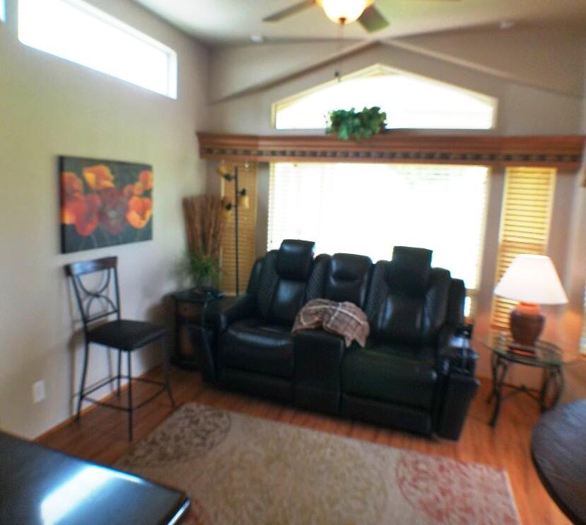 754 Ave 44, Unit 754 Indio, CA 92203 - Photo 17 of 50 a living room with furniture and a large window