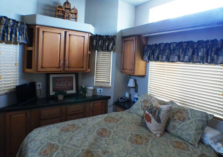 754 Ave 44, Unit 754 Indio, CA 92203 - Photo 33 of 50 a bedroom with a bed and a window