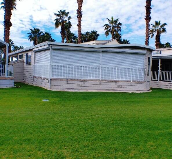 754 Ave 44, Unit 754 Indio, CA 92203 - Photo 50 of 50 a view of a backyard with a garden