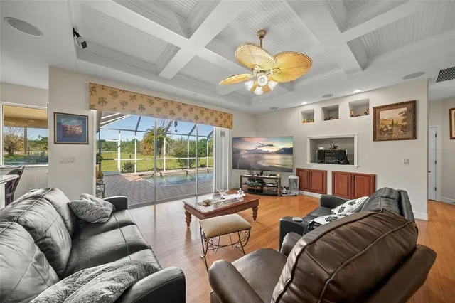 a bedroom with a bed and a table