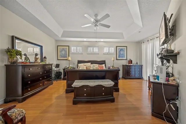 a large spacious bathroom with a double vanity sink a mirror and a bathtub