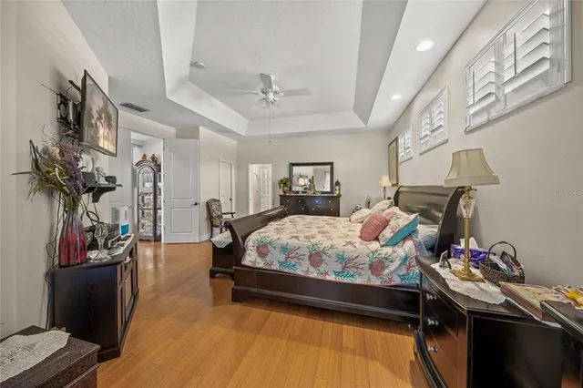 a bathroom with a granite countertop sink shower and a mirror