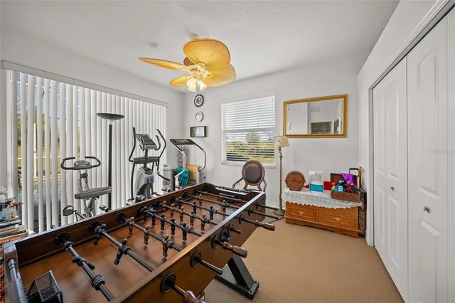 a kitchen with a table and chairs in it