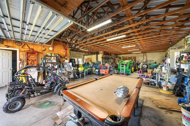 a view of a lake with houses in the back