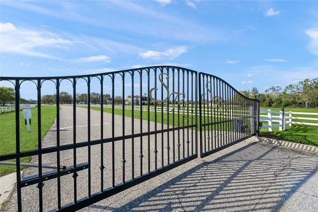 a view of a field with an ocean